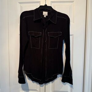Beautiful button down black blouse with white stitching. Size Medium